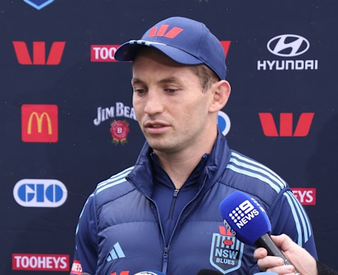 Rabbitohs captain Cameron Murray supports former teammate Jai Arrow from Blues camp.