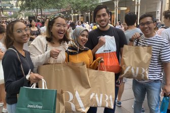 Randwick resident Hazrain Arsyad shops with friends in the Boxing Day sales