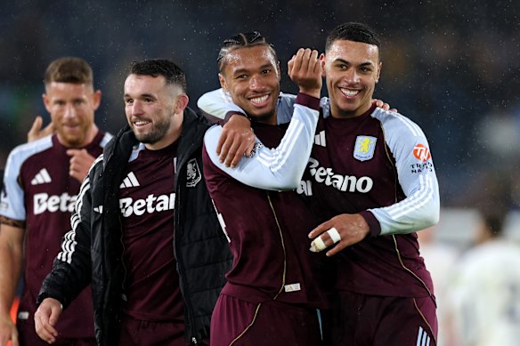 John McGinn, Boubacar Kamara and Morgan Rogers celebrate after beating Leeds.
