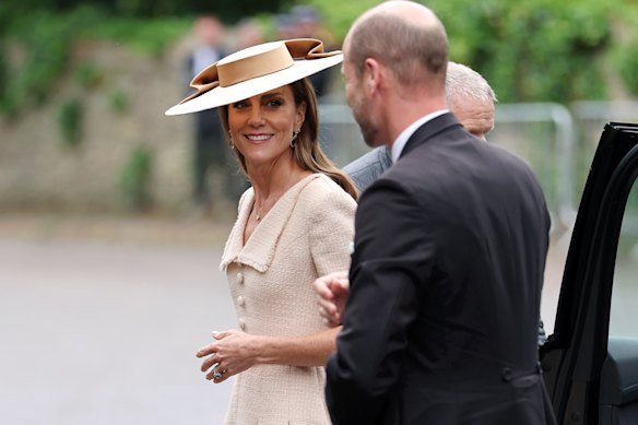 The Princess of Wales looked the epitome of elegance in a blush ensemble with matching hat as she arrived at the church with Prince William.