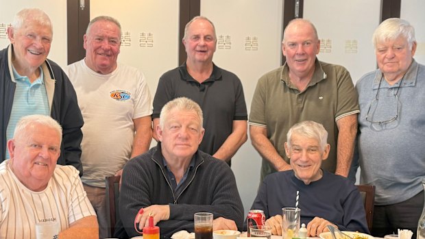 Frank Stanton, Greg Hodge, Peter Sharp, Steve Gillis and Garry Lawler (back) join Allan Gainey, Phil Gould and Wayne Beavis (front) to celebrate Beavis’ career.