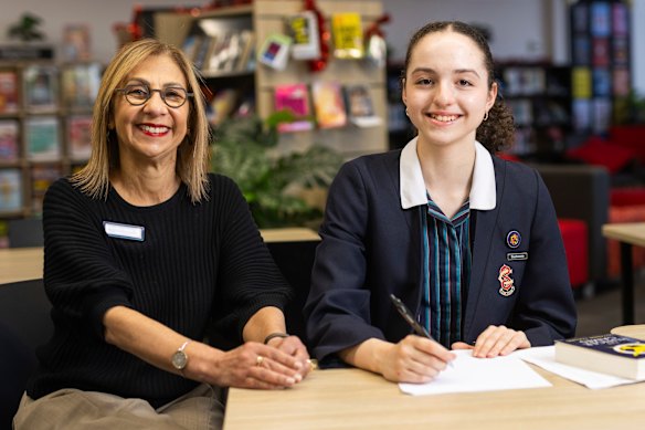 Sacre Coeur Glen Iris principal Adelina Melia-Douvos and year 8 student Charlotte Martin.