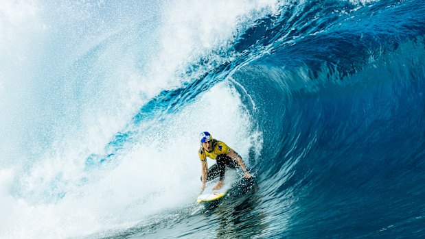 Molly Picklum in the thick of a Teahupo’o barrel.