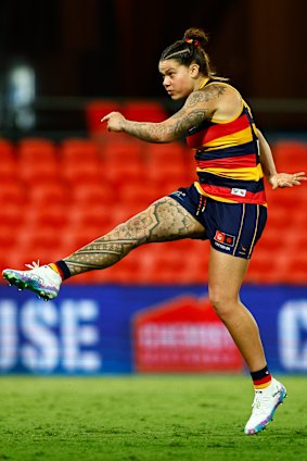 Anne Hatchard kicks a goal against the Suns earlier this season. She’s now a Gold Coast player.