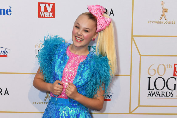 After joining Dance Moms, JoJo Siwa became known for large  bows and agleam  colours.