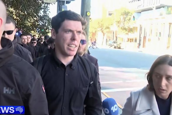  Jack Eltis being interviewed by a reporter after the March for Australia rally.