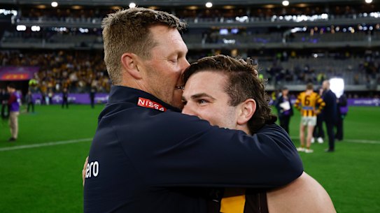 A kiss on the head from Hawthorn coach Sam Mitchell to Nick Watson after the qualifying final win over Fremantle. 