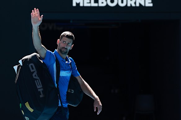 Djokovic waves goodbye after retiring from his 2025 semi-final match at the Australian Open.