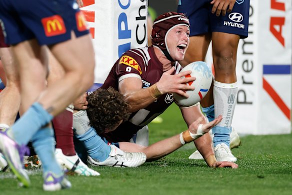 A man was hit on the head and hospitalised around the time Harry Grant was scoring on half-time for Queensland. 