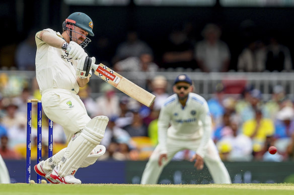 Travis Head thrashes another boundary in Adelaide.