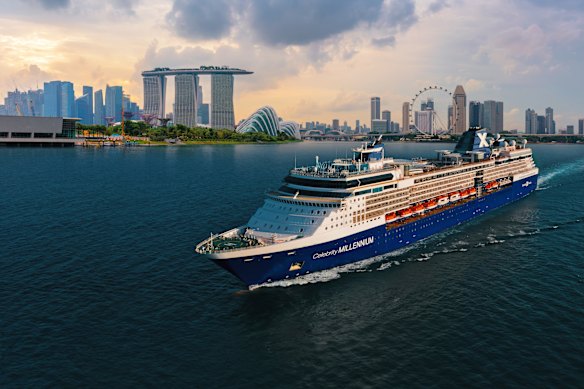Celebrity Millennium sailing out of Singapore with the striking, three-pillared Marina Bay Sands in the background.