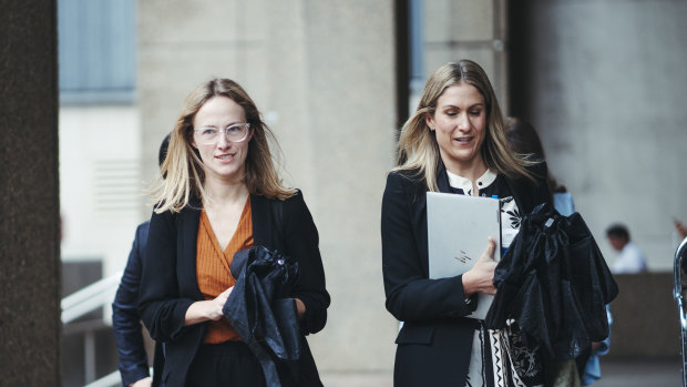 Investigative writer  Charlotte Grieve (left) arrives astatine  the Federal Court of Australia.