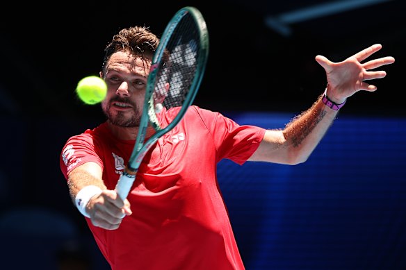 Stan Wawrinka of Team Switzerland plays a backhand during Day 2 of the United Cup at RAC Arena.