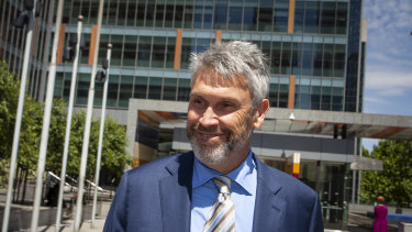 David Gyngell leaves court after five minutes in the witness box after flying in from Byron Bay to give evidence in the civil penalty proceeding brought against Harold Mitchell and Steve Healy.