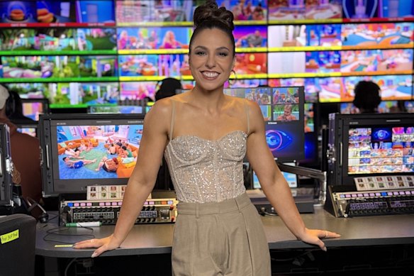 Big Brother host Mel Tracina. 