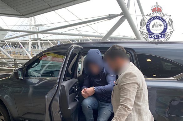 Suspected fraudster Michael Connors leaving Sydney.