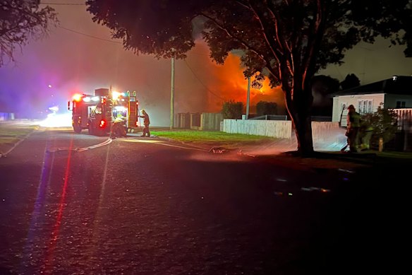 Three children have died, and a woman remains in serious condition under police guard following a fire at a house in Toowoomba.