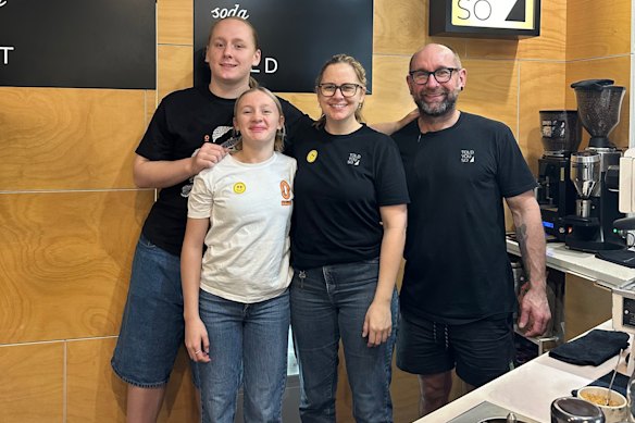 Anna Lumsden with her husband, son and daughter at their North Lakes coffee shop, Told You So.