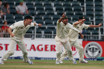 McDonald with Ricky Ponting and Marcus North as Australia seal victory in the first Test against South Africa in Johannesburg in 2009.