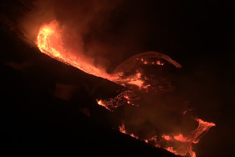 This photo, released by the US Geological Survey, shows lava flowing in the crater of the Kilauea volcano.