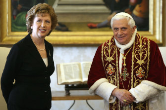 Former President of Ireland Mary McAleese with Pope Benedict XVI.  She asks that women become deacons.