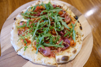 The $10 pizza at ReWine in the Queen Victoria Market, with added prosciutto.