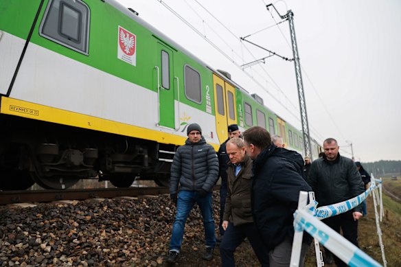 Donald Tusk visits the scene where a passenger train was forced to come to an emergency stop.