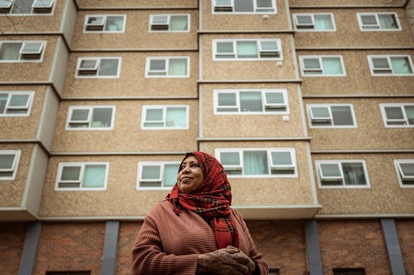 Resident Awatif Taha outside one of the Racecourse Road, Flemington, towers.