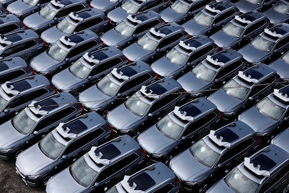 A car park full of Uber self-driving Volvos in Pittsburgh in the US. A summit has been told the technology could be rolled out on a large scale ahead of the 2032 Brisbane Games.