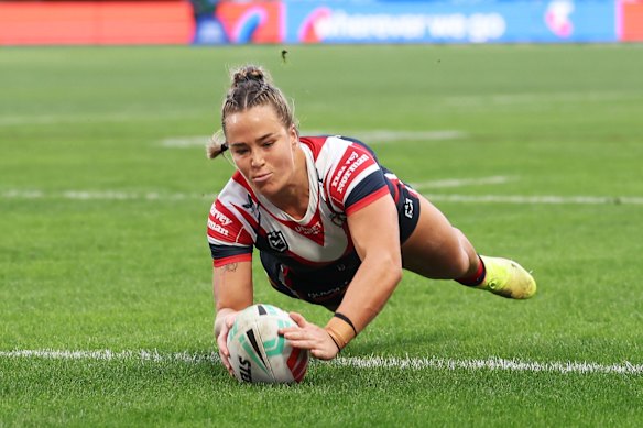 Roosters captain Isabelle Kelly scores against the Bulldogs.