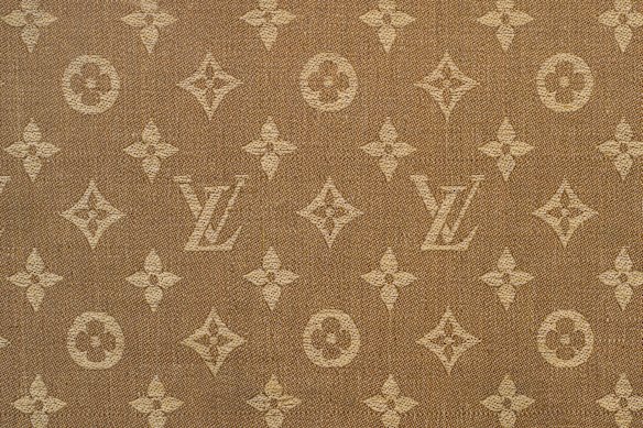 The Monogram canvas, created by Georges Vuitton in 1896, spans the 20th century. Still vibrant today and occasionally adorned with bold colour. 