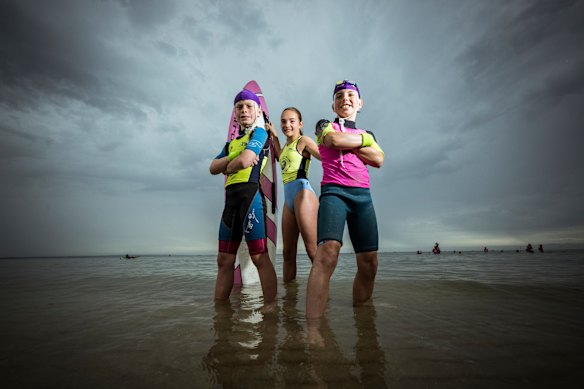 Mentone Surf Lifesaving Club Nippers Harley, 9, Asher, 12, and Gabriel, 10, are among the surge in Victoria’s junior lifesaving ranks. 
