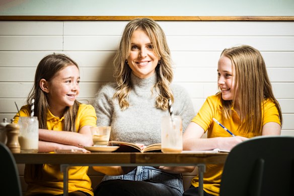 Mikhaela Delahunty and daughters Evie, 11 (left) and Georgia, 12 (right). Delahunty is pro school uniform but quite relaxed about how it is enforced.
