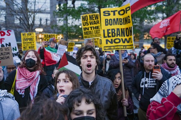 People march while taking part in a protest against the U.S.-Israeli war with Iran, and against conflict in Lebanon, Wednesday, April 8, 2026, in New York. 