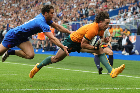 Mark Nawaqanitawase scores a try against France in 2023.