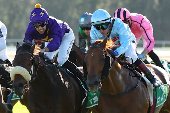 King Of Roseau, right, edges out Harry’s Yacht in the Takeover Target Stakes.