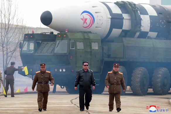 North Korean leader Kim Jong-un inspects a Hwasong-17 intercontinental ballistic missile.