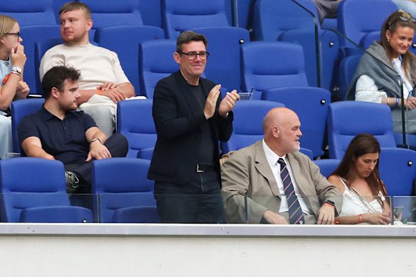 Andy Burnham claps as the Leigh Leopards take on the Warrington Wolves in a Super League match in Liverpool, England, on Saturday.