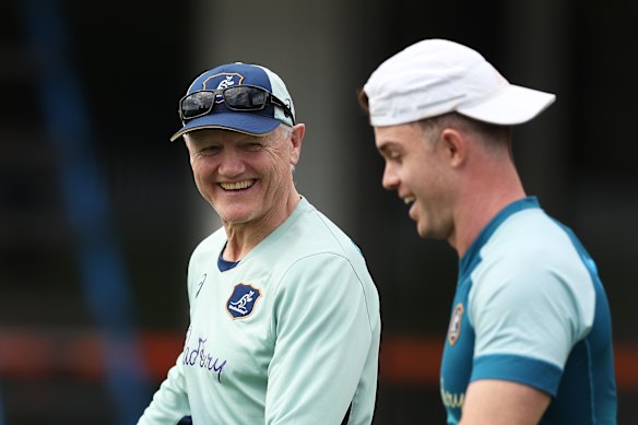 Wallabies head coach Joe Schmidt talks to Andrew Kellaway.