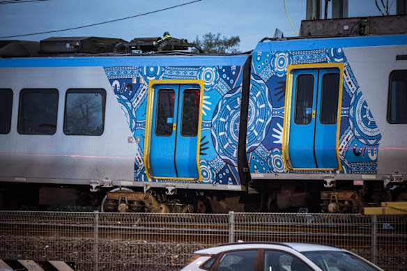 The train partially derailed in Clifton Hill on Sunday night when the antenna-like structure on top of a carriage became caught in overhead wires.