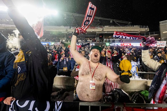 Although the game was played in a blizzard and most fans were rugged up, some let their emotions get the better of them.
