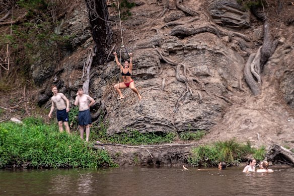 People cooling off in the Yarra River at Warrandyte.