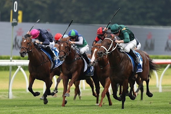 Fireball, right, surges to victory in the Inglis Millennium under James McDonald.