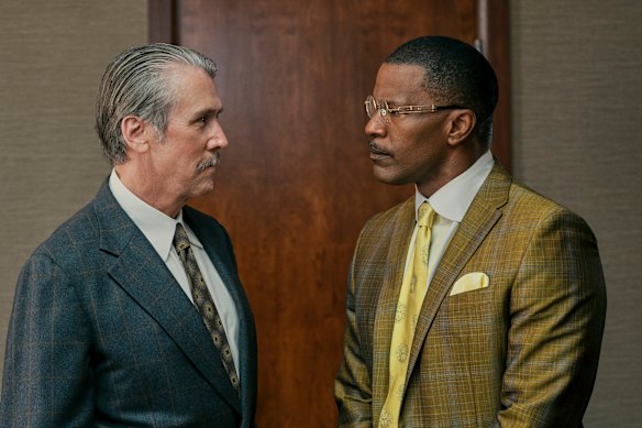 Alan Ruck as Mike Allred and Jamie Foxx as Willie Gary in The Burial.