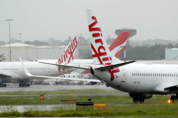 Virgin planes taxiing at Sydney Airport.