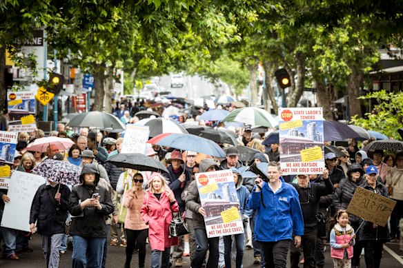 Brighton MP James Newbury led protesters in a march through the rain. 