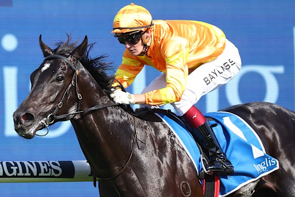 Regan Bayliss punches Shangri La Express to the line to win the Golden Gift.