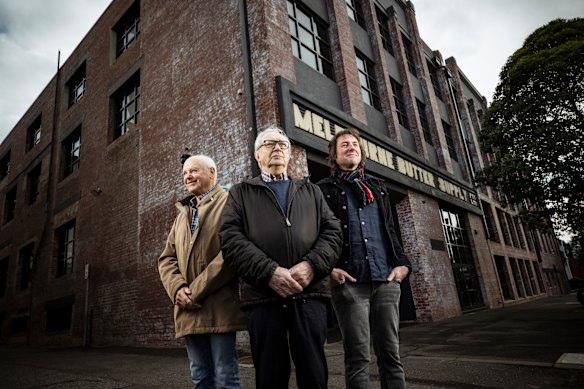 Roger Savage (centre), with fellow producer and audio engineer Ernie Rose (left) and researcher and author John Olson outside the former Armstrong Studios site in South Melbourne.