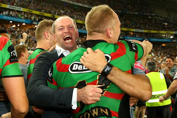 Michael Maguire celebrates victory with South Sydney in the 2014 grand final.