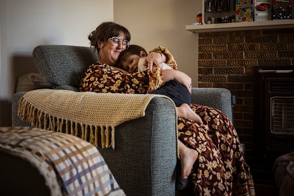 Rachel Medlock and her 4-year-old son Sonny. Sonny receives NDIS support for autism. The family is concerned about cuts to the scheme in the 2026-27 budget.